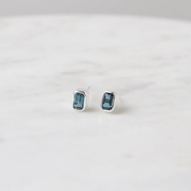 Women’s oval stud earrings-Sterling Silver Bezel Set Emerald Cut London Blue Topaz Earrings