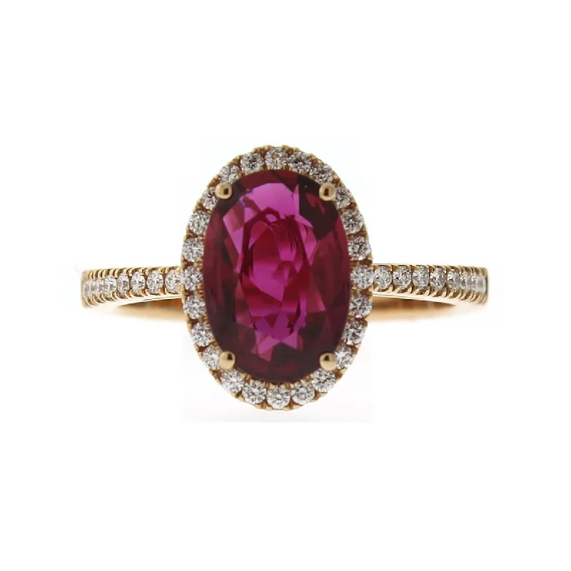 Women’s oval engagement ring-18K Rose Gold Oval Ruby and Diamond Halo Ring