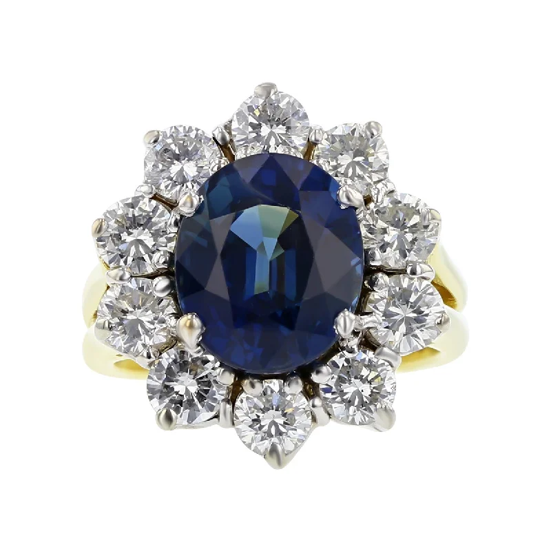 Women’s halo diamond engagement ring-18K Yellow Gold Blue Sapphire and Diamond Halo Ring