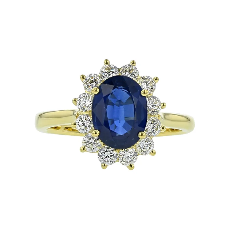 Women’s platinum three-stone engagement ring-18K Gold Oval Sapphire and Diamond Halo Ring