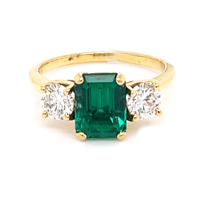 Women’s engraved engagement ring-Emerald-cut Emerald and Diamond 3-Stone Ring