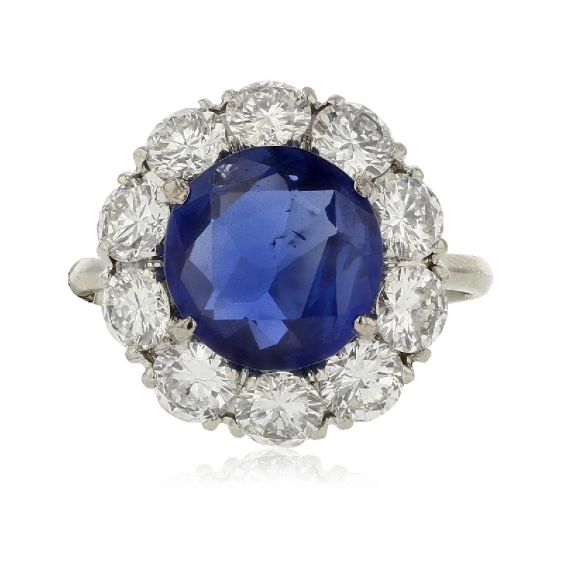 Women’s vintage-inspired diamond engagement ring-18K White Gold Burma Sapphire and Diamond Halo Ring