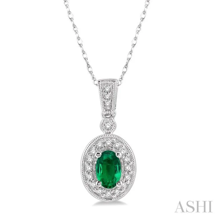 Women’s abstract necklace-6x4mm Oval Cut Emerald and 1/8 Ctw Round Cut Diamond Pendant in 14K White Gold with Chain