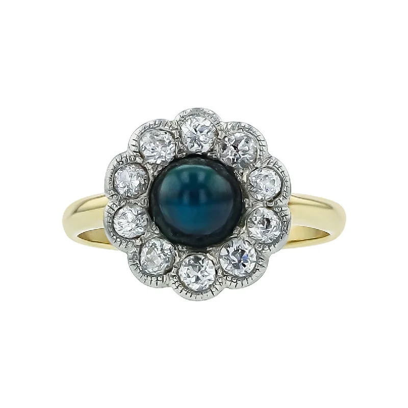 Women’s classic engagement ring-Cabochon Sapphire and Diamond Scalloped Halo Ring