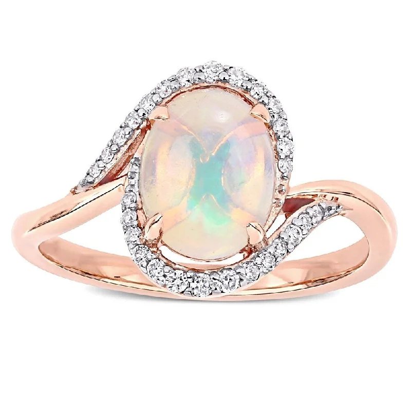 Women’s wedding band-Miadora 10k Rose Gold Oval-Cut Ethiopian Blue Opal & 1/7ct TDW Diamond Bypass Ring