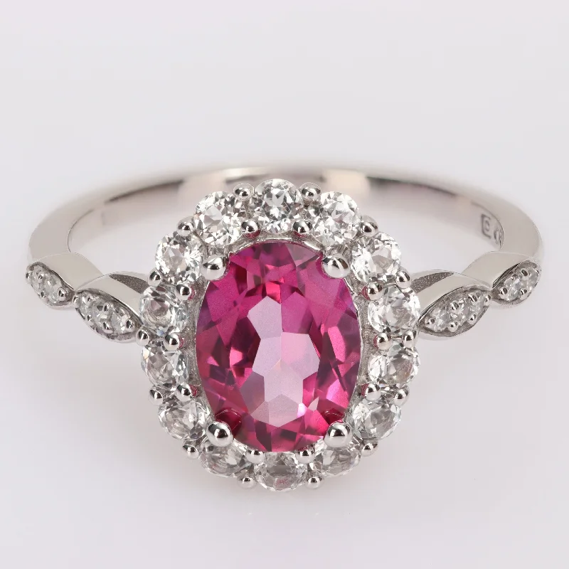 Women’s luxury gemstone ring-Miadora Oval-cut Pink and White Topaz with Diamond Accent Halo Cocktail Ring in 10k White Gold