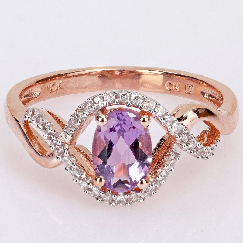 Women’s solitaire ring-Miadora 10k Rose Gold Amethyst and 1/6ct TDW Diamond Halo Infinity Ring