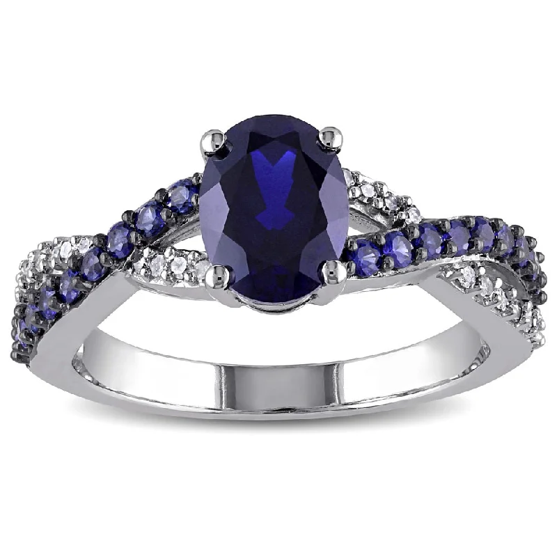 Women’s twisted band ring-Miadora 10k White Gold Created Blue Sapphire and 1/10ct TDW Diamond Ring (H-I, I2-I3)