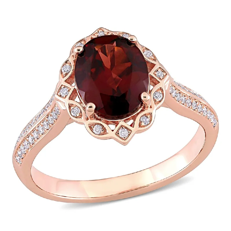 Women’s infinity ring-Miadora 14k Rose Gold Oval-cut Garnet and 1/6ct TDW Diamond Vintage Halo Ring