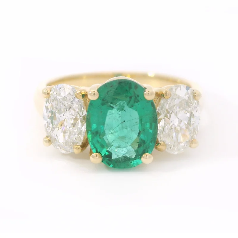 Women’s leaf design ring-14kt Yellow Gold 1.84ct Emerald and Diamond Ring