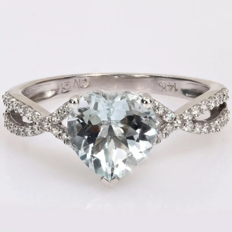 Women’s heart-shaped ring-Miadora Heart-cut Aquamarine and 1/5ct TDW Diamond Crossover Ring in 14k White Gold