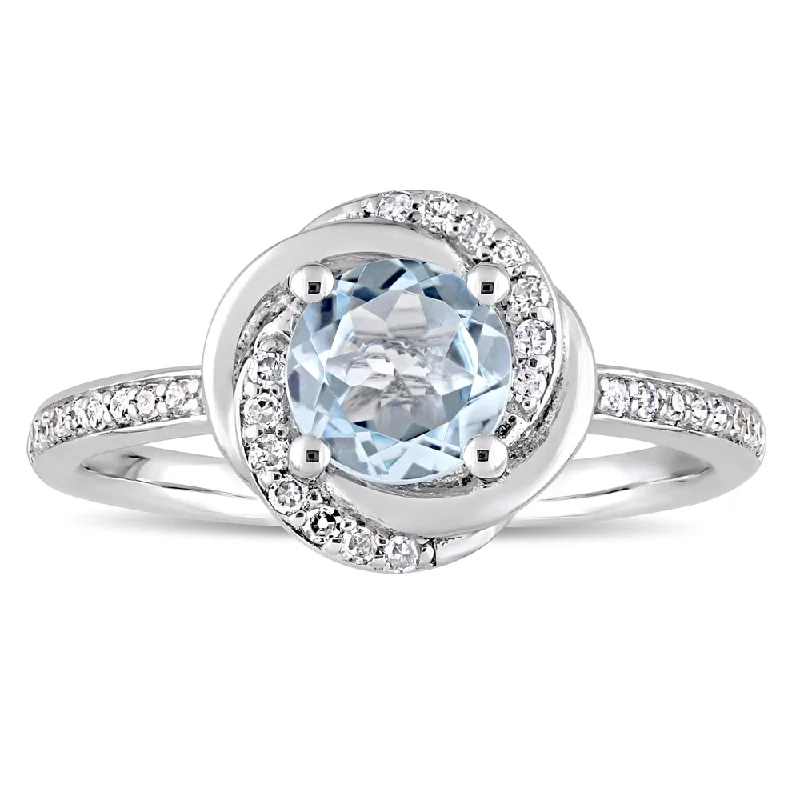 Women’s silver ring-Miadora 10k White Gold Sky-Blue Topaz and 1/6ct TDW Diamond Swirl Halo Ring